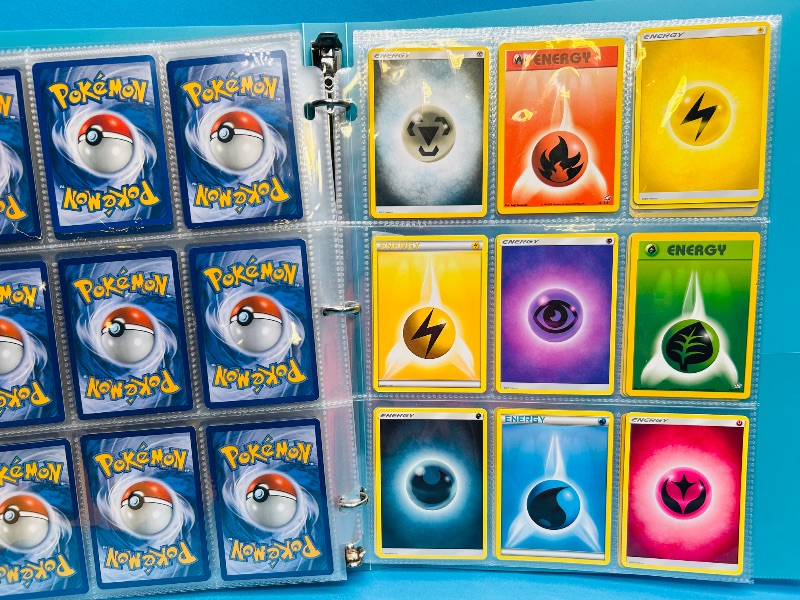 Photo 1 of 165542… final sale now returns/refunds -135 mix d Pokémon energy cards in binder 