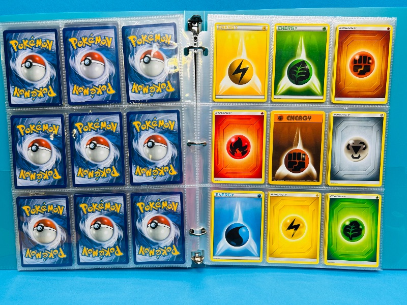 Photo 1 of 165542… final sale now returns/refunds -135 mix d Pokémon energy cards in binder