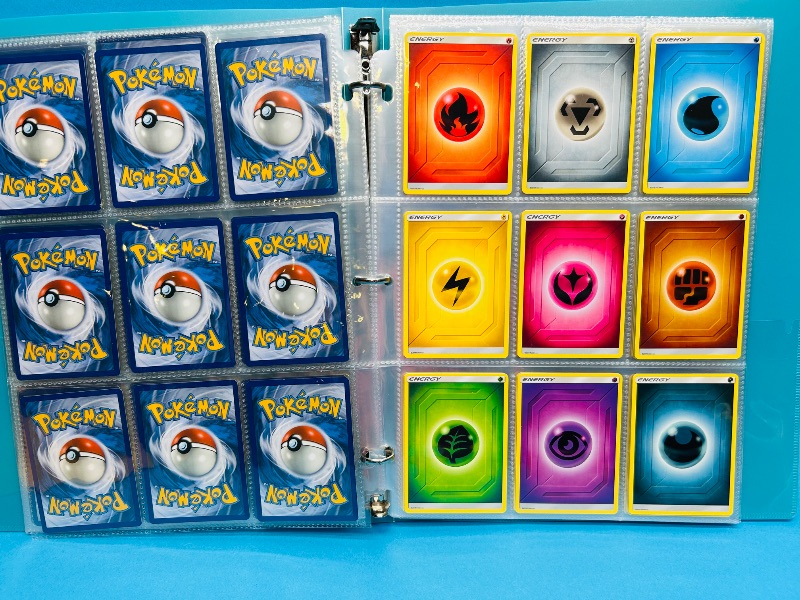 Photo 1 of 165542… final sale now returns/refunds -135 mix d Pokémon energy cards in binder 