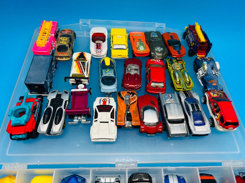 Photo 1 of 165545…48 die cast cars in two sided case
