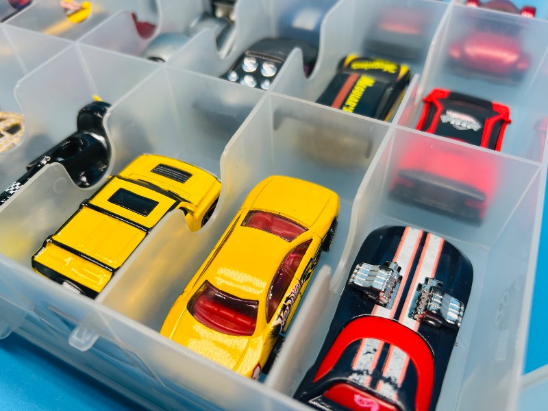 Photo 1 of 165545…48 die cast cars in two sided case