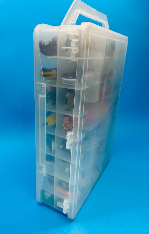 Photo 1 of 165545…48 die cast cars in two sided case