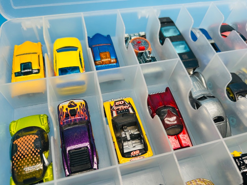 Photo 1 of 165545…48 die cast cars in two sided case