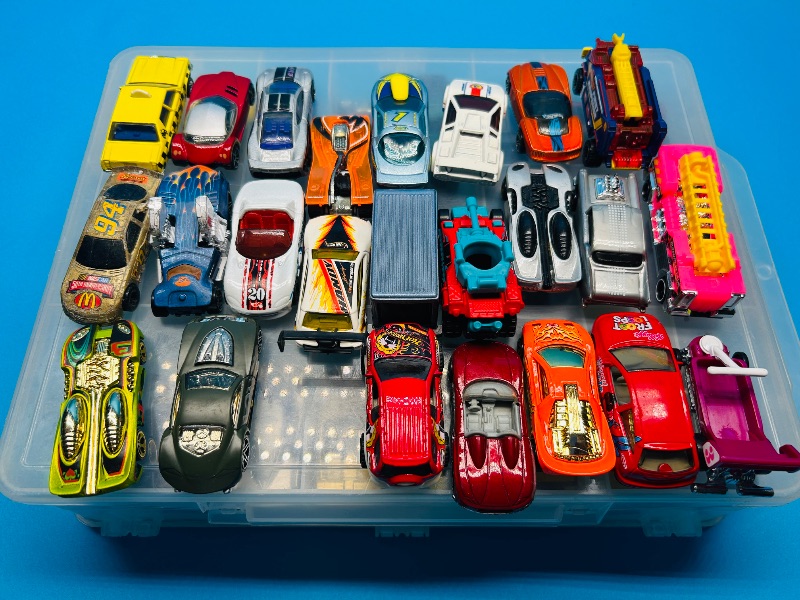 Photo 1 of 165545…48 die cast cars in two sided case