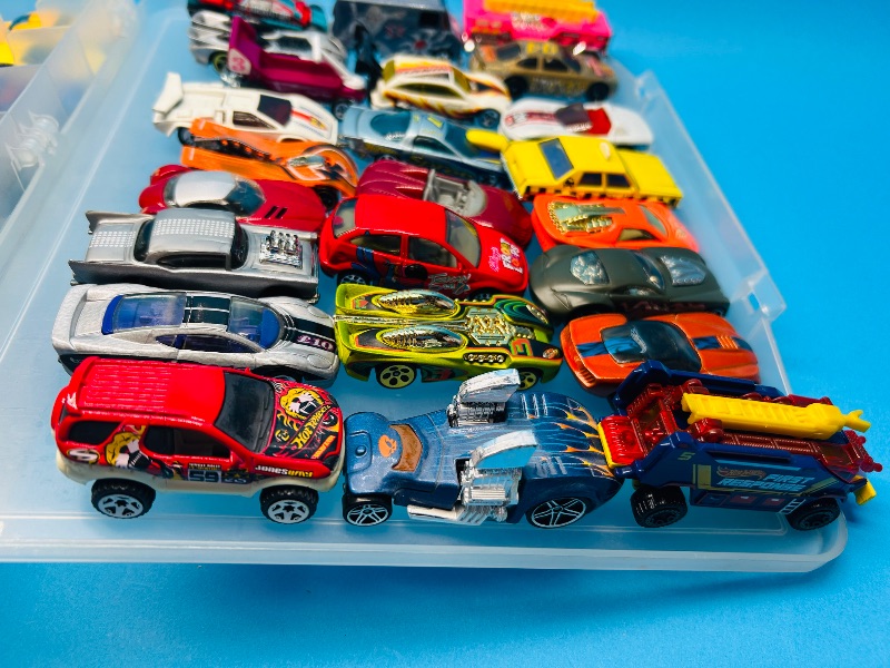 Photo 1 of 165545…48 die cast cars in two sided case