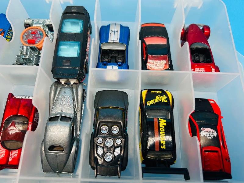 Photo 1 of 165545…48 die cast cars in two sided case