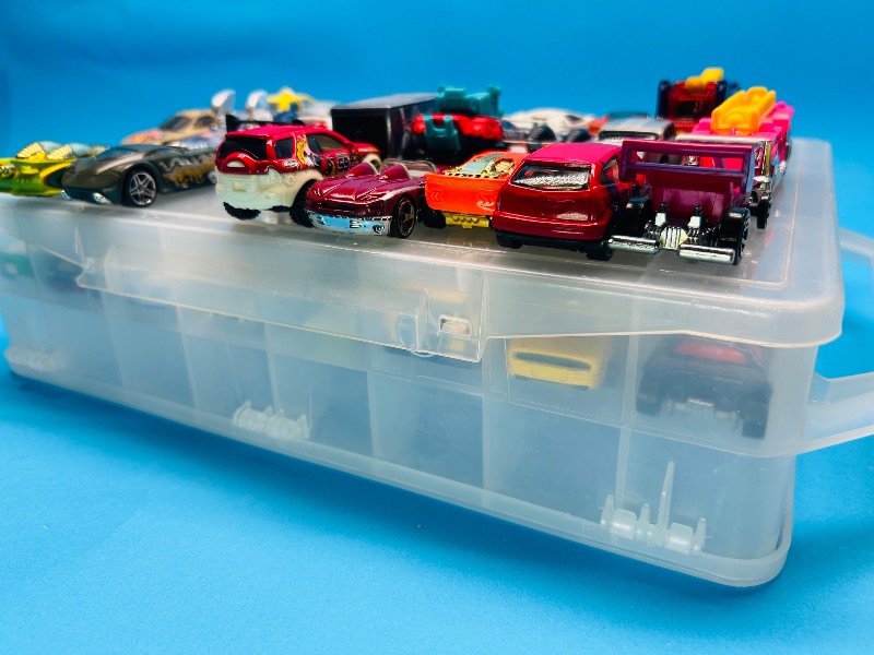 Photo 1 of 165545…48 die cast cars in two sided case