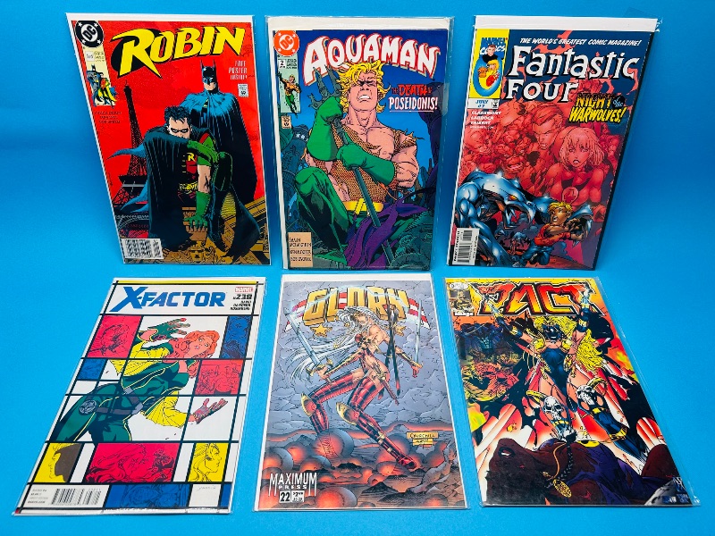Photo 1 of 165573…6  comics in plastic sleeves 