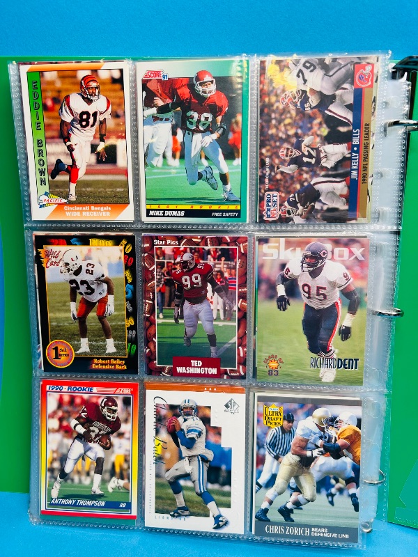 Photo 1 of 165597…final sale no return/refund-270 mixed football cards in binder