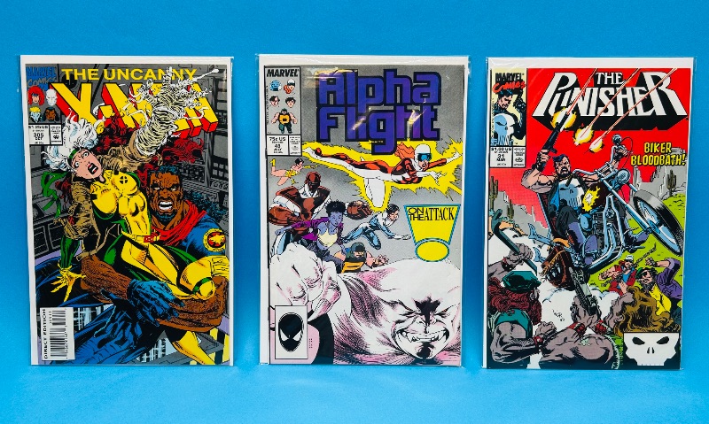 Photo 1 of 165601…3  comics in plastic sleeves 
