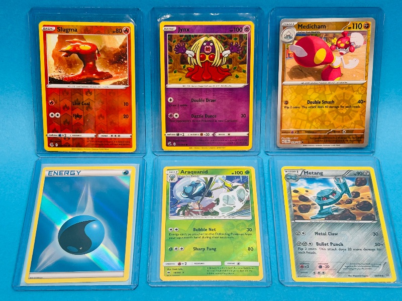 Photo 1 of 165639…6 reverse holo Pokémon card in hard plastic sleeves
