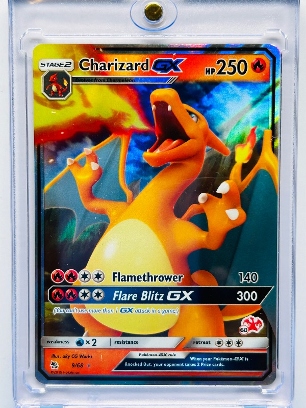 Photo 1 of 165648…Charizard GX hologram Pokémon card 9/68 in hard plastic case