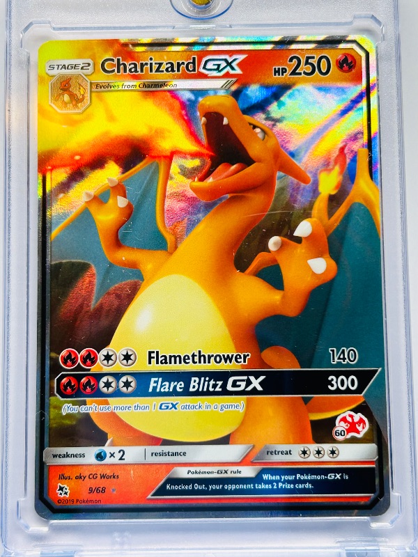 Photo 1 of 165648…Charizard GX hologram Pokémon card 9/68 in hard plastic case