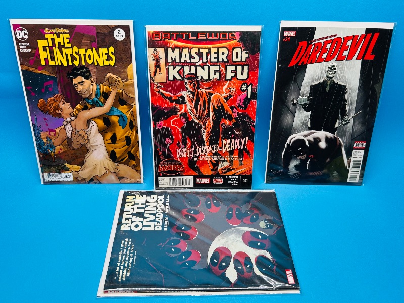 Photo 1 of 165656…4 comics in plastic sleeves