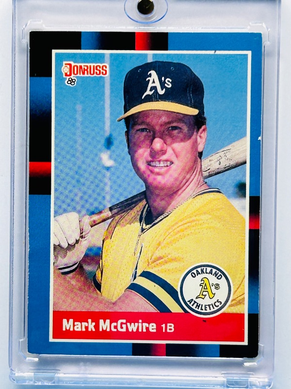 Photo 1 of 165668…Rookie Mark McGwire card 256 in hard plastic case