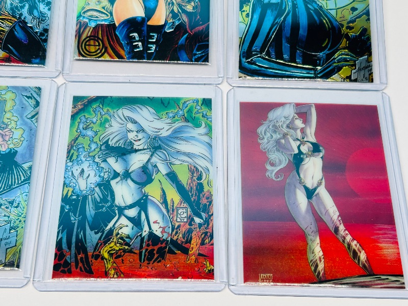 Photo 1 of 165695…8 chromium Lady Death cards in hard plastic sleeves
