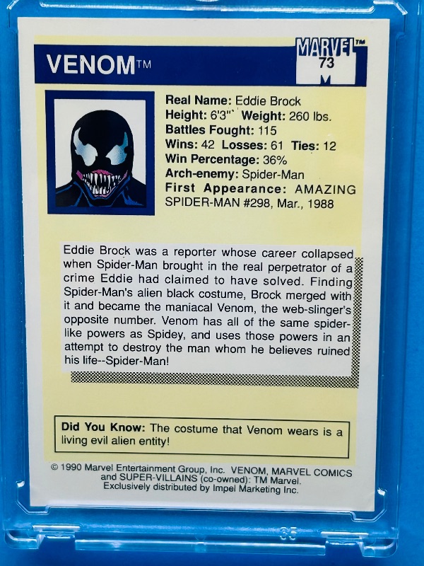 Photo 1 of 165703…Marvel Venom card 73  in hard plastic case