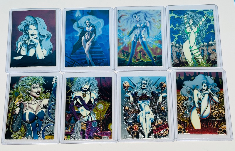 Photo 1 of 165706…8 chromium Lady Death cards in hard plastic sleeves