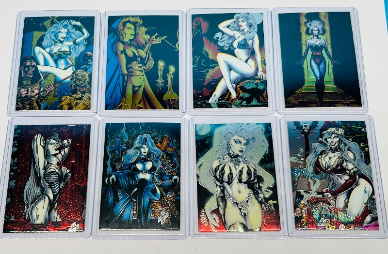 Photo 1 of 165707… 8 chromium Lady Death cards in hard plastic sleeves 