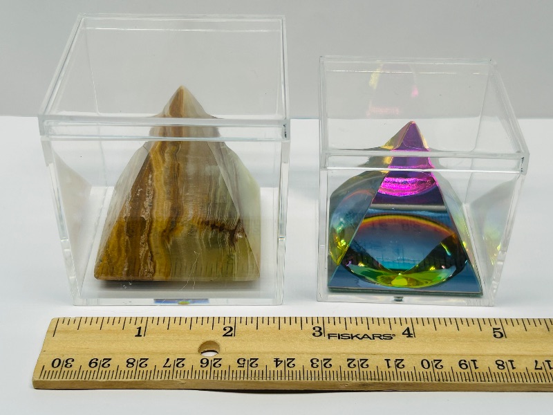 Photo 1 of 165711…small onyx and acrylic pyramids in display cases 
