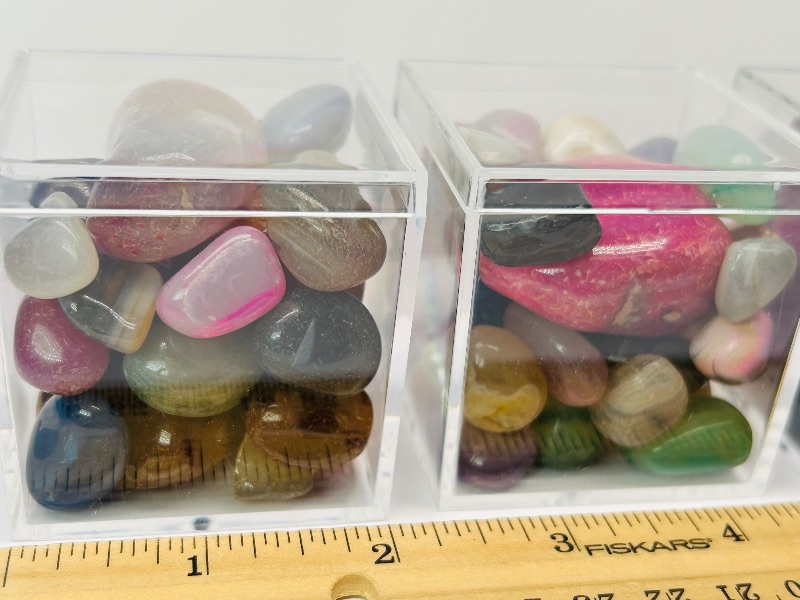 Photo 1 of 165721…3 small cases of polished pebbles 2” x 2”