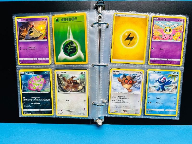 Photo 1 of 165736…   final sale no return/refund- 136 mixed Pokemon cards in binder 