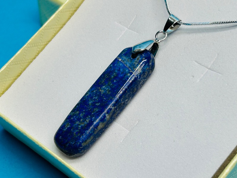 Photo 1 of 165748… polished rock pendant on 18” chain in gift box