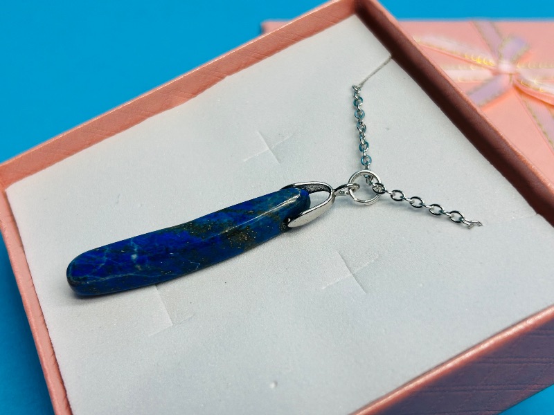 Photo 1 of 165749… polished rock pendant on 17” chain in gift box