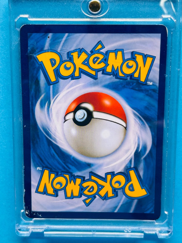 Photo 1 of 165758…Hologram Eevee V Pokémon card in hard plastic case