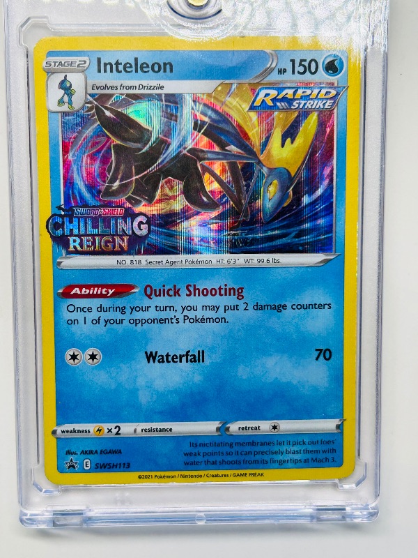 Photo 1 of 165760…holo Inteleon rapid strike Pokémon card in hard plastic case