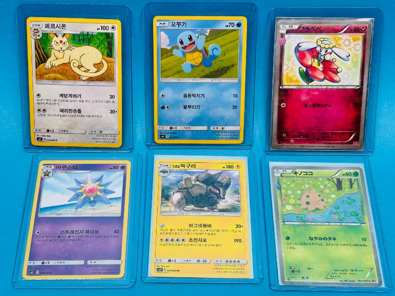 Photo 1 of 165765… 6 Asian Pokemon cards in hard plastic sleeves