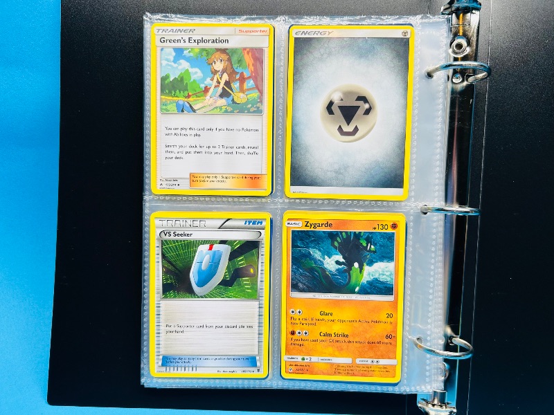 Photo 1 of 1065813… final sale no return/refund-104 mixed Pokémon cards in binder