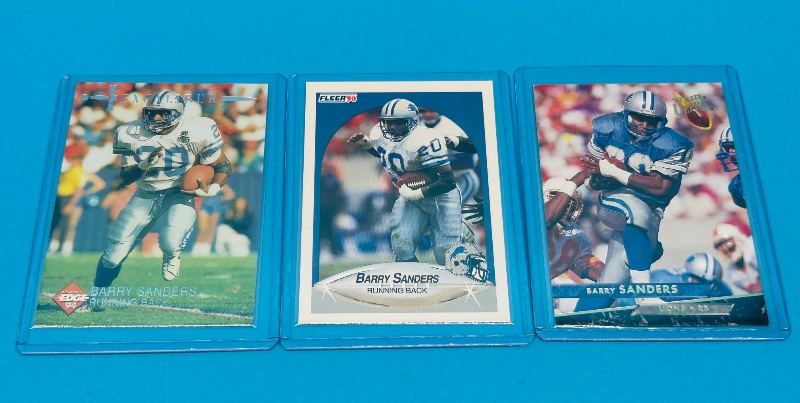 Photo 1 of 165869…Barry Sanders  cards in hard plastic sleeves 