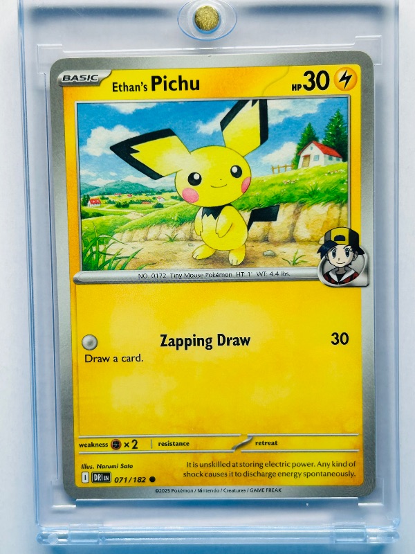 Photo 1 of 165883…Ethan’s Pichu Pokémon card in hard plastic case