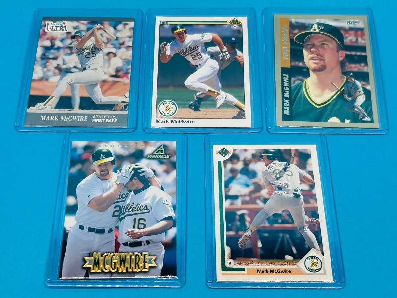 Photo 1 of 165898…Mark McGwire cards in hard plastic sleeves 