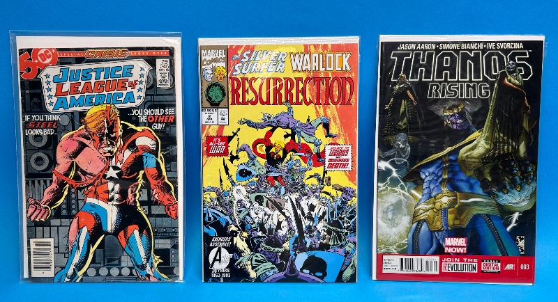 Photo 1 of 166007…3  comics in plastic sleeves 