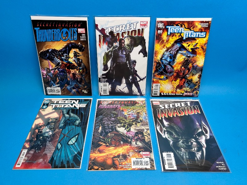 Photo 1 of 166023…6  comics in plastic sleeves 