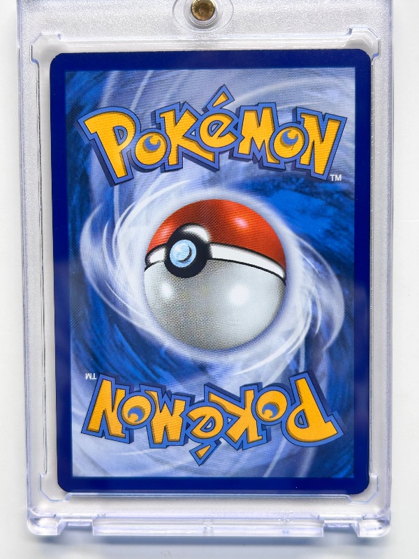 Photo 1 of 166029…Machop Pokémon card in hard plastic case