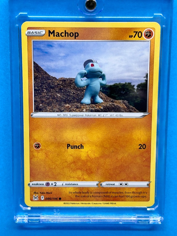 Photo 1 of 166029…Machop Pokémon card in hard plastic case