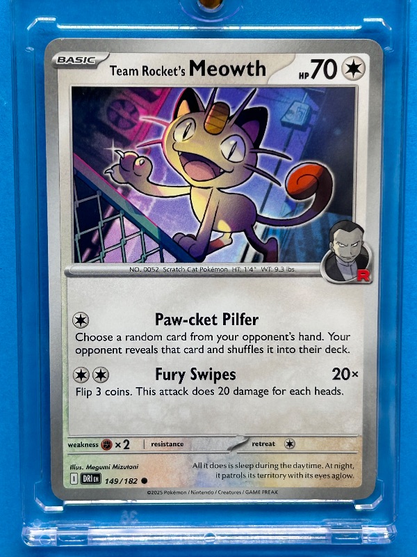 Photo 1 of 166030…Team Rocket’s Meowth Pokémon card in hard plastic case