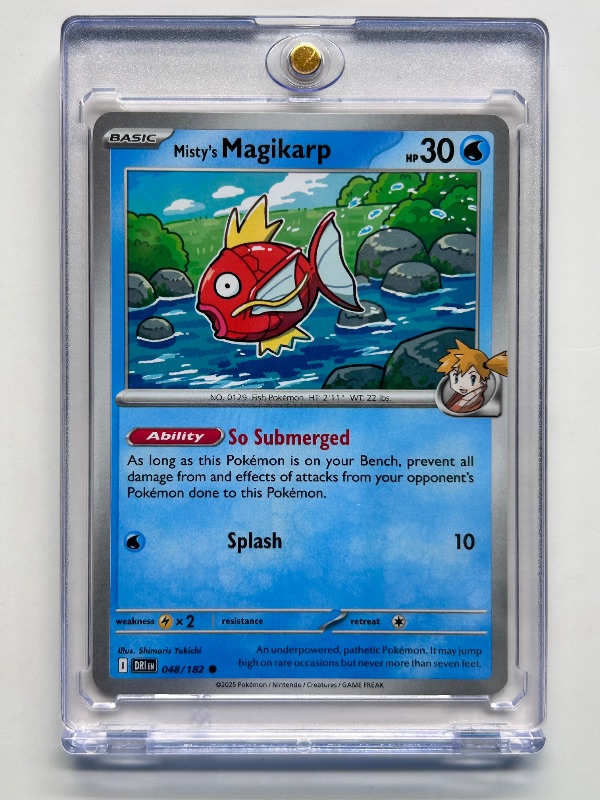 Photo 1 of 166031…Misty’s Magikarp Pokémon card in hard plastic case