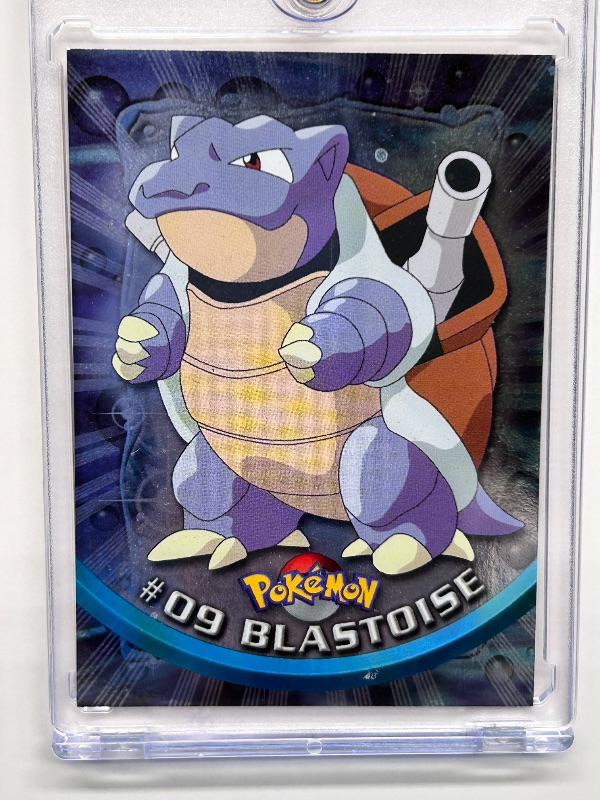 View 2 of 166042…Holofoil Blastoise Pokemon card in hard plastic case