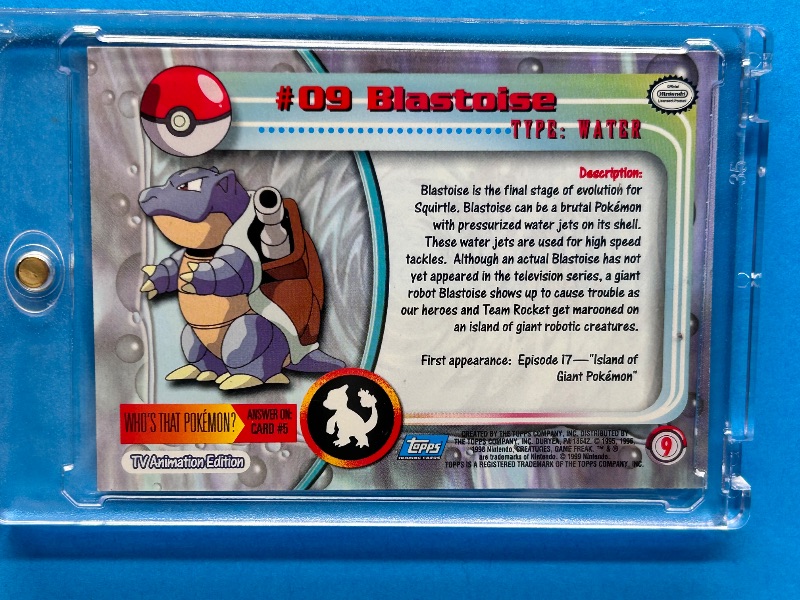 View 3 of 166042…Holofoil Blastoise Pokemon card in hard plastic case