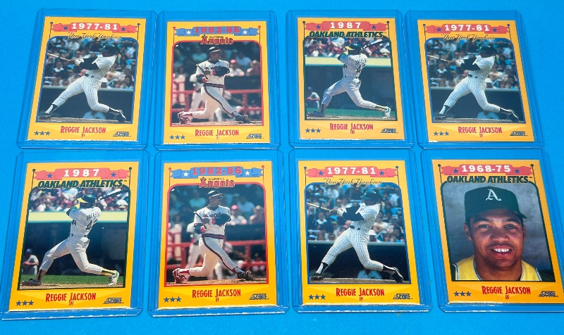 Photo 1 of 166079…8 Reggie Jackson  cards in hard plastic sleeves 