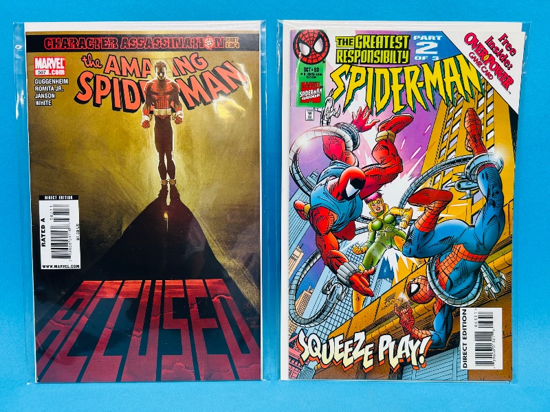 Photo 1 of 166135…2 Spider-Man comics in plastic sleeves 