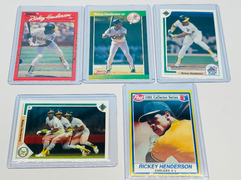 Photo 1 of 166179…5 Rickey Henderson cards in hard plastic sleeves