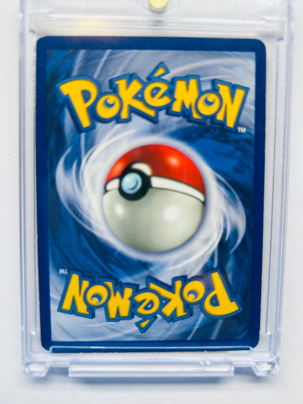 Photo 1 of 166487…Pikachu Pokemon card in hard plastic case 1990’s 