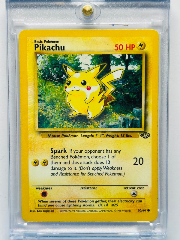 Photo 1 of 166487…Pikachu Pokemon card in hard plastic case 1990’s