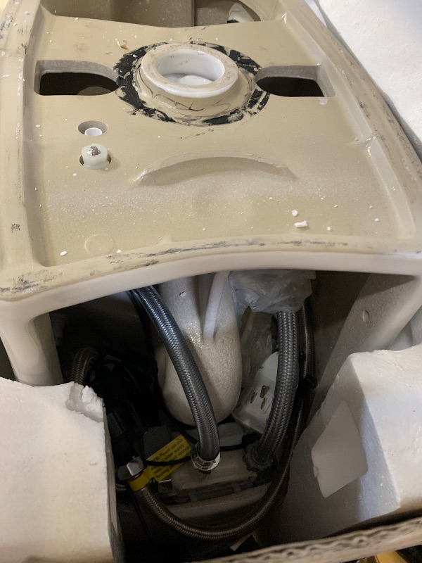 Photo 1 of WOODBRIDGE B0970S One Piece Elongated Smart Tankless Bidet Toilet, ADA Height, Auto Flush, Foot Sensor Operation, Heated Seat with Integrated Multi Function Remote Control in White