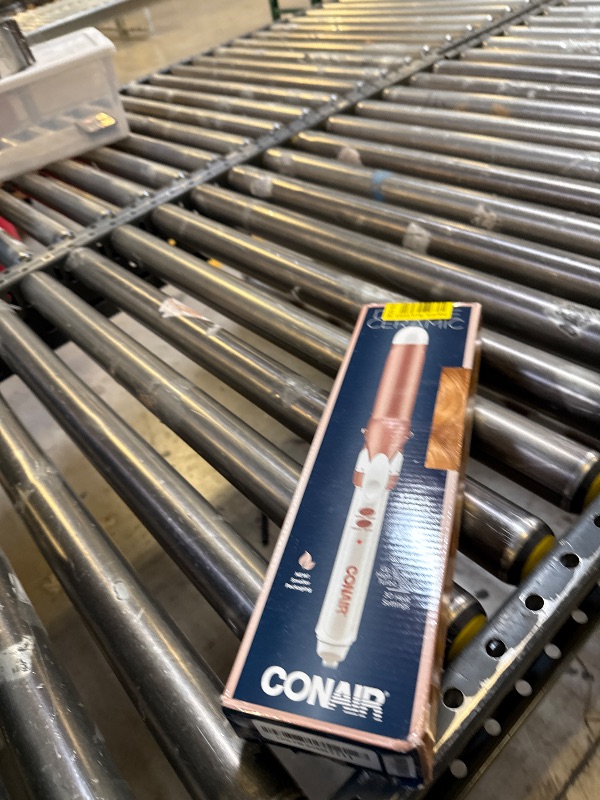 Photo 1 of Conair Double Ceramic 1 1/4-Inch Curling Iron, 1 ¼ inch barrel produces loose curls – for use on medium and long hair
